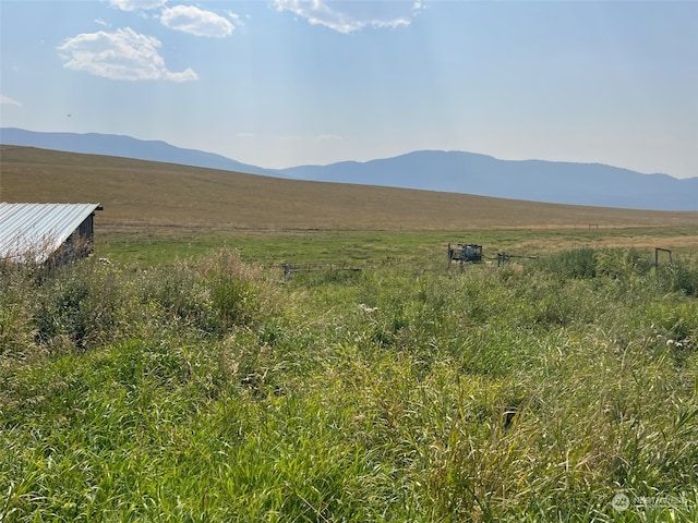 property view of mountains featuring a rural view