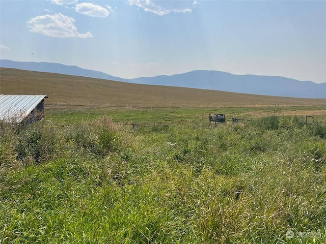 property view of mountains with a rural view