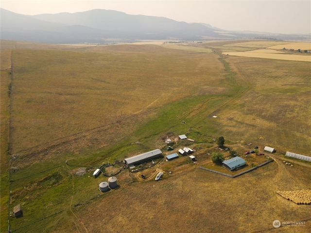 aerial view featuring a mountain view and a rural view