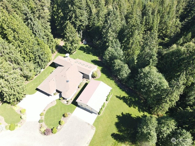 aerial view with a wooded view