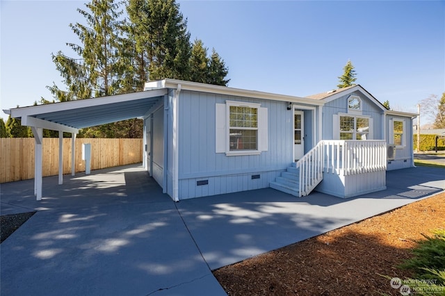 view of front of house with a carport