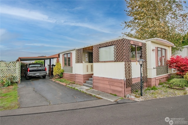 manufactured / mobile home with a carport