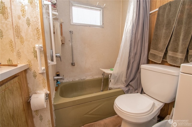 full bathroom with toilet, shower / tub combo with curtain, and vanity