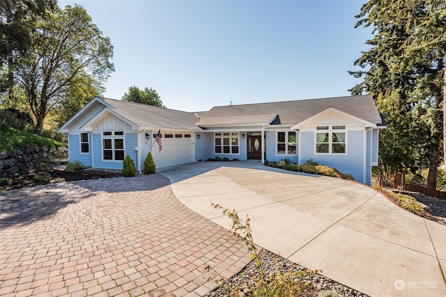 ranch-style home with a garage