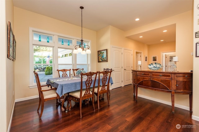 dining room featuring dark wood-style flooring, recessed lighting, and baseboards