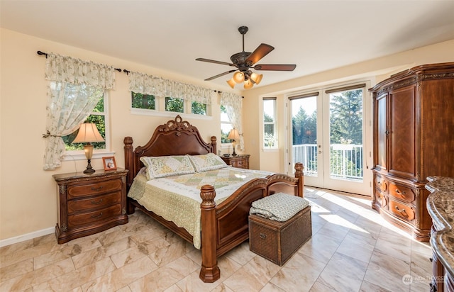 bedroom with ceiling fan, access to outside, french doors, and baseboards