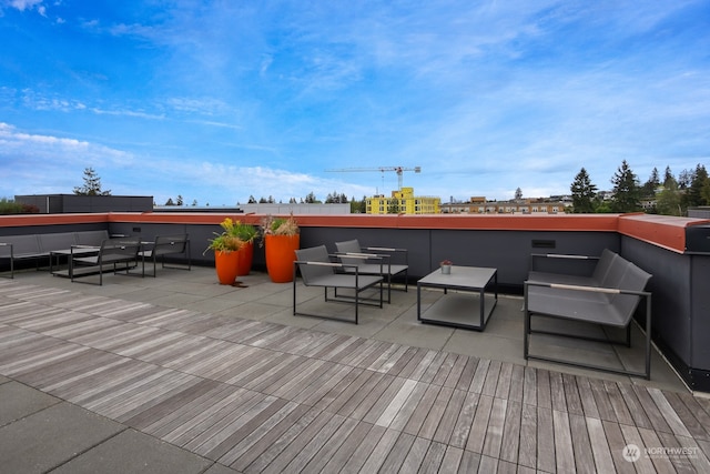 wooden deck with outdoor lounge area