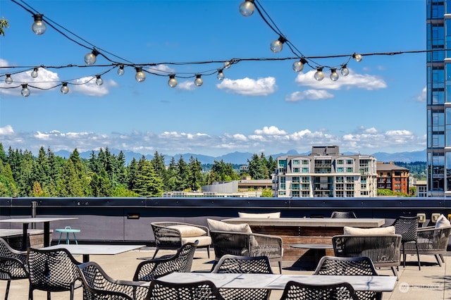 view of patio / terrace featuring a mountain view