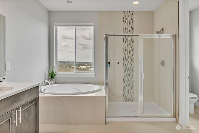 full bathroom with tile patterned flooring, vanity, toilet, and plus walk in shower