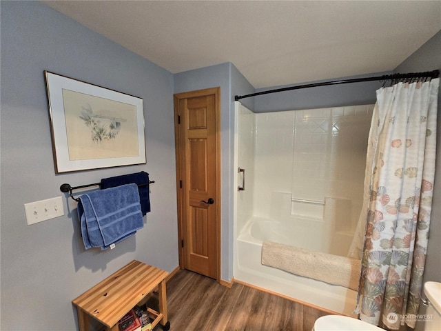 538 Canal Dr NE, Ocean Shores, WA 98569 - full bathroom with toilet, shower / bath combo, and wood finished floors