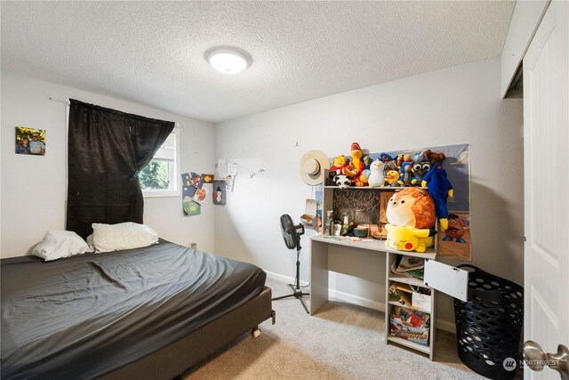 116 173rd St S, Spanaway, WA 98387 - bedroom featuring baseboards, carpet, and a textured ceiling