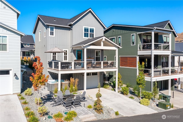 exterior space with a balcony and a garage