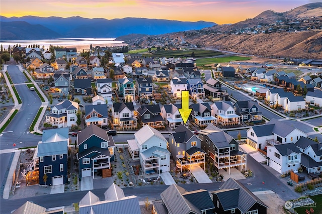 aerial view at dusk with a mountain view