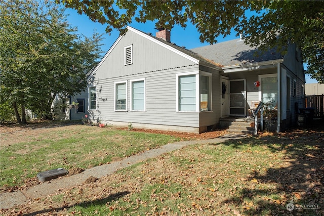 exterior space featuring a front yard