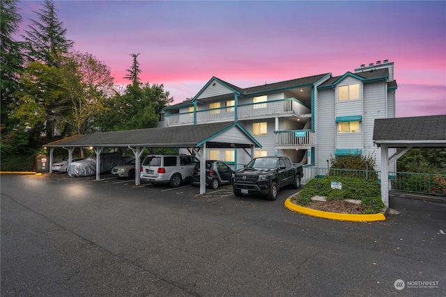 view of outdoor building at dusk