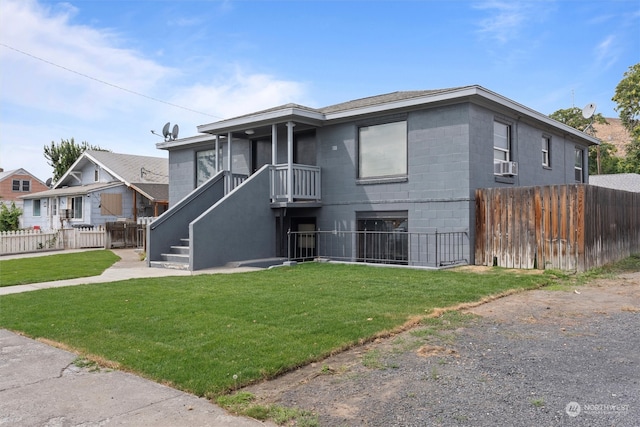 view of front of home with a front yard