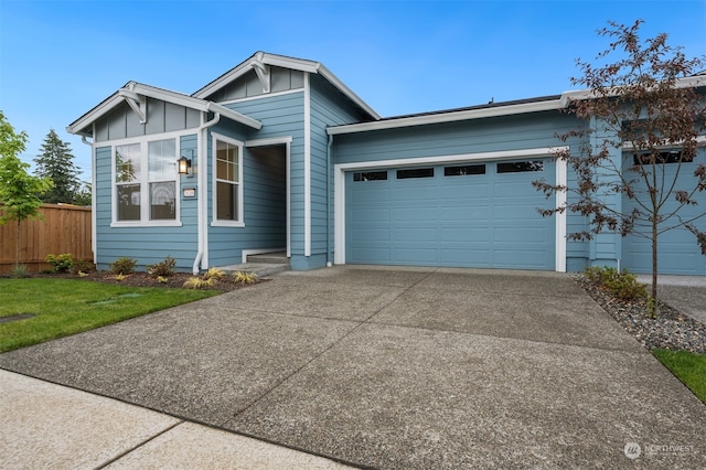 view of front of property with a garage