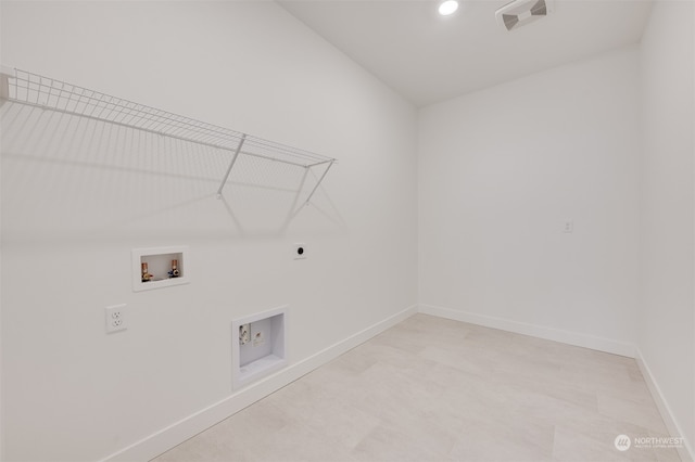 laundry area with hookup for a washing machine, laundry area, visible vents, baseboards, and electric dryer hookup