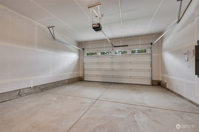 garage featuring a garage door opener