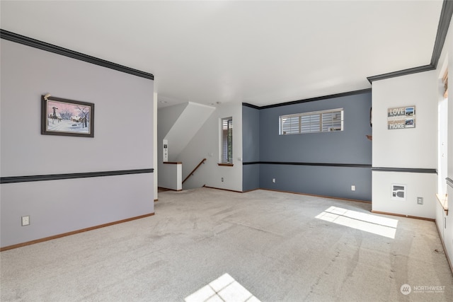 unfurnished living room with crown molding and light colored carpet