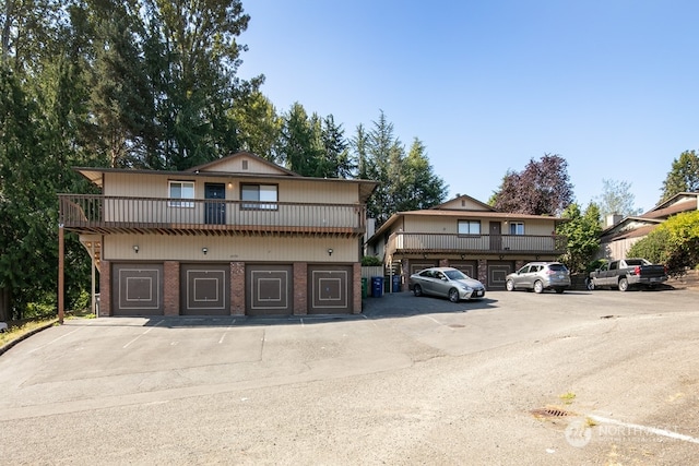 front of property featuring a balcony