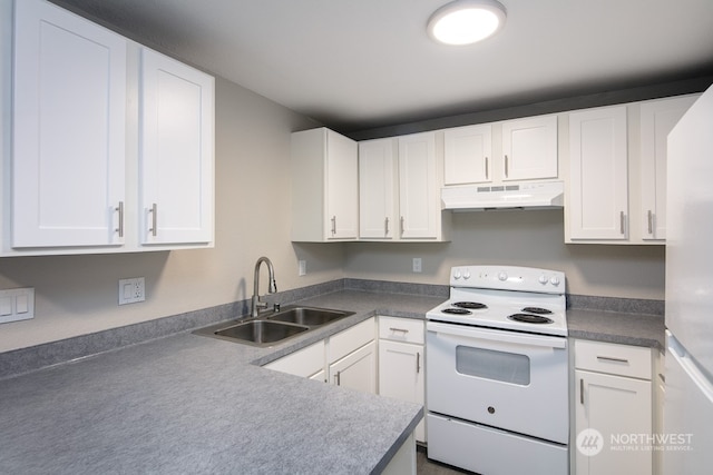 kitchen featuring white electric range, refrigerator, white cabinetry, and sink