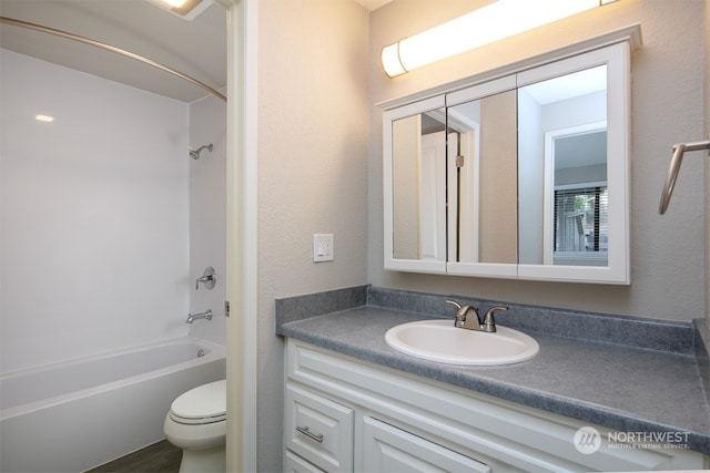 full bathroom with vanity, toilet,  shower combination, and hardwood / wood-style flooring