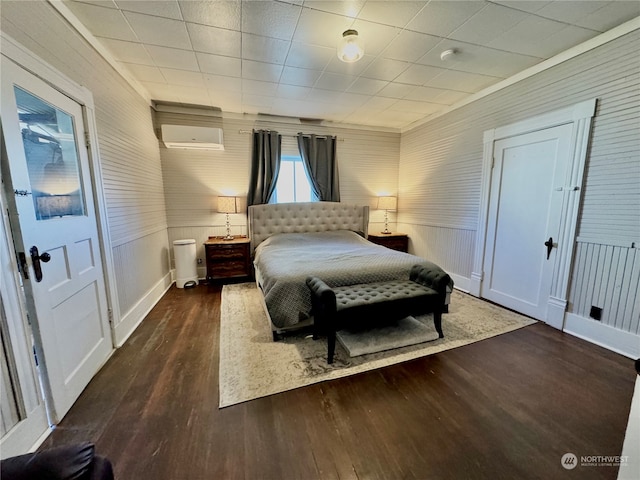 bedroom featuring dark hardwood / wood-style flooring