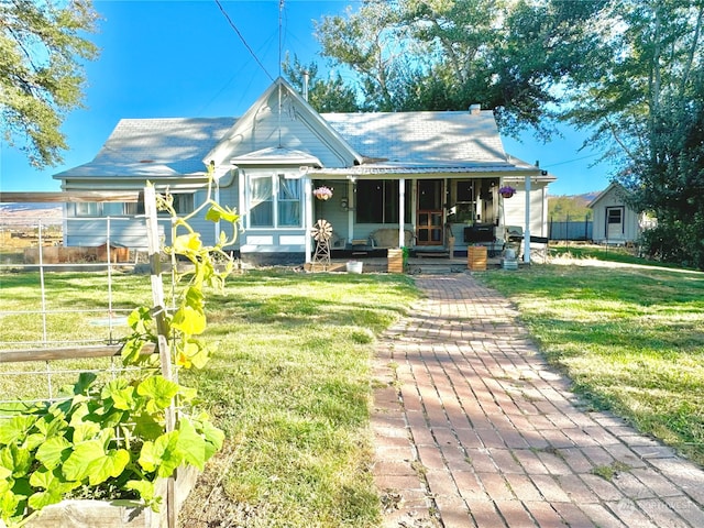 view of front of property with a front lawn