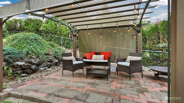 view of patio / terrace with an outdoor living space and a pergola