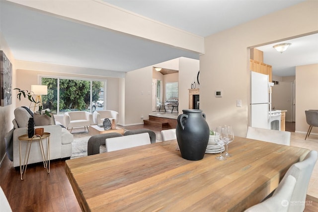 dining area with hardwood / wood-style flooring