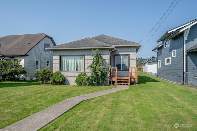 1506 Morgan St, Aberdeen, WA 98520 - bungalow-style house featuring a shingled roof and a front lawn