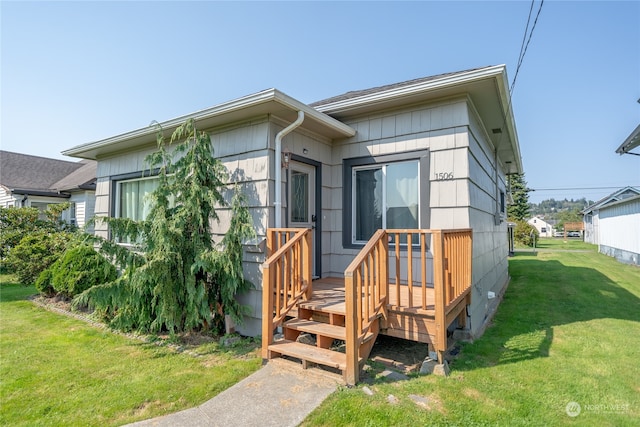 exterior space with a front lawn