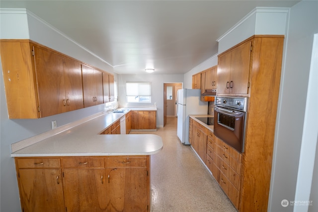 kitchen featuring crown molding, kitchen peninsula, and white appliances