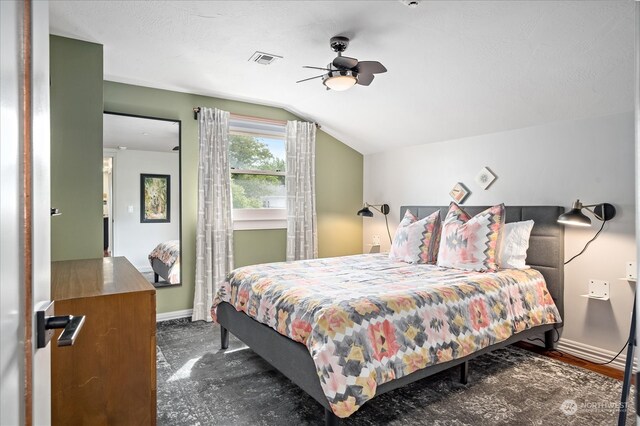 bedroom with lofted ceiling and ceiling fan