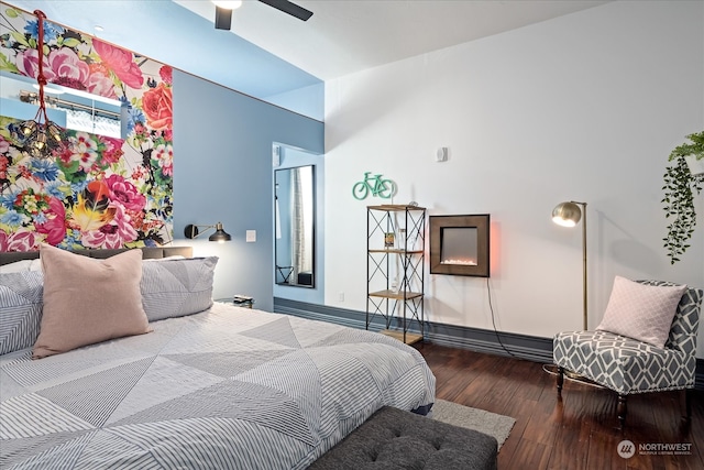 bedroom featuring ceiling fan and hardwood / wood-style flooring