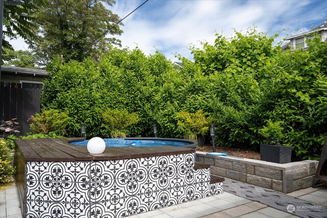 view of patio / terrace featuring a wooden deck