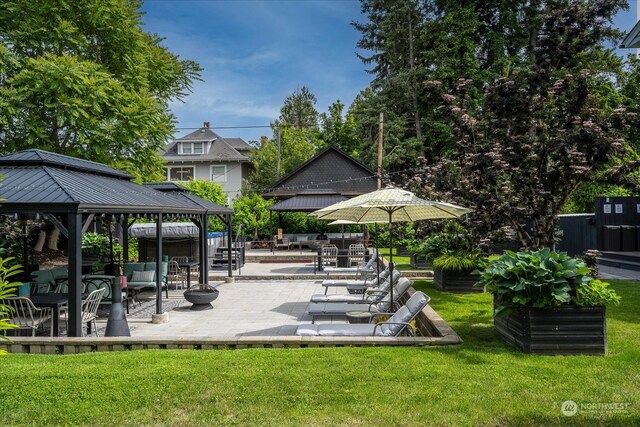 exterior space featuring a patio area and a gazebo