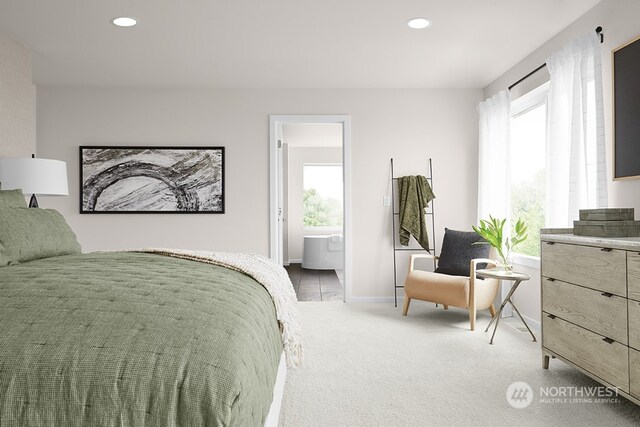 bedroom featuring recessed lighting, light colored carpet, connected bathroom, and baseboards