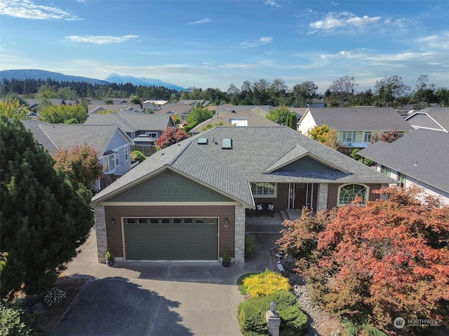 view of front of home with a mountain view