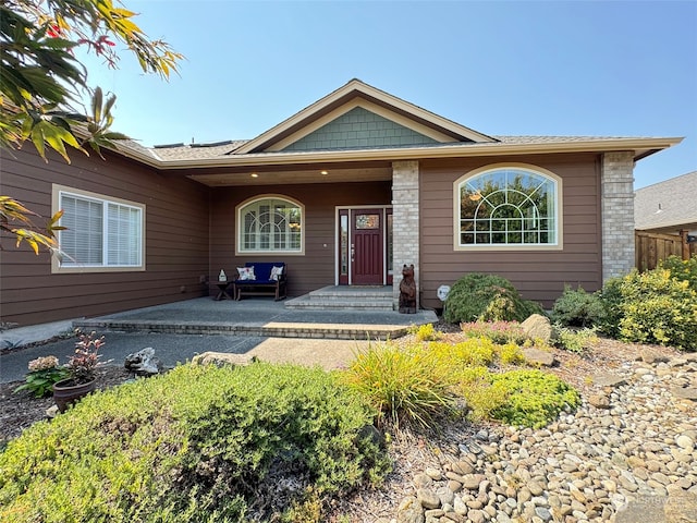 single story home featuring a patio