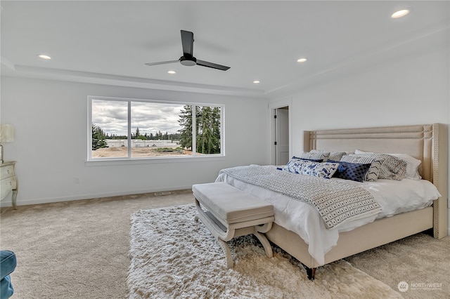 bedroom featuring ceiling fan and light colored carpet