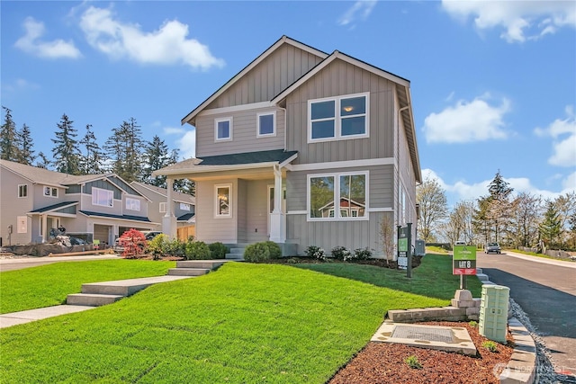 16212 76th Avenue Ct E, Puyallup, WA 98375 - craftsman house with board and batten siding and a front yard
