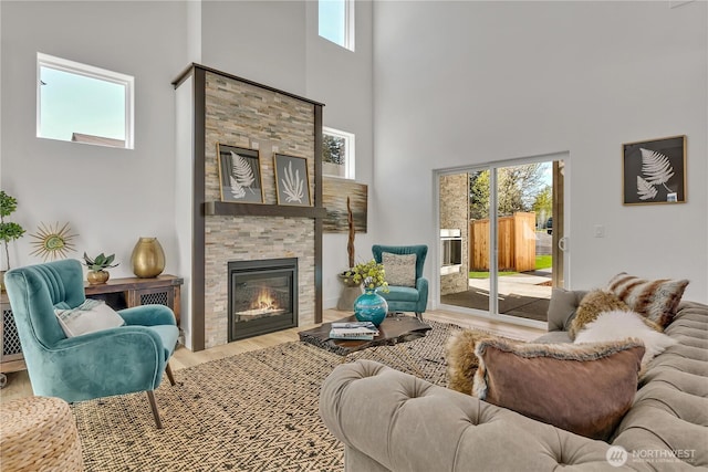 16212 76th Avenue Ct E, Puyallup, WA 98375 - living area with a high ceiling, wood finished floors, and a wealth of natural light