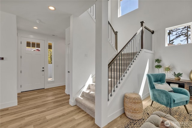 16212 76th Avenue Ct E, Puyallup, WA 98375 - entryway featuring light wood-type flooring, baseboards, recessed lighting, and stairs