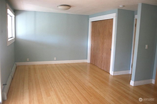 empty room featuring light wood-type flooring