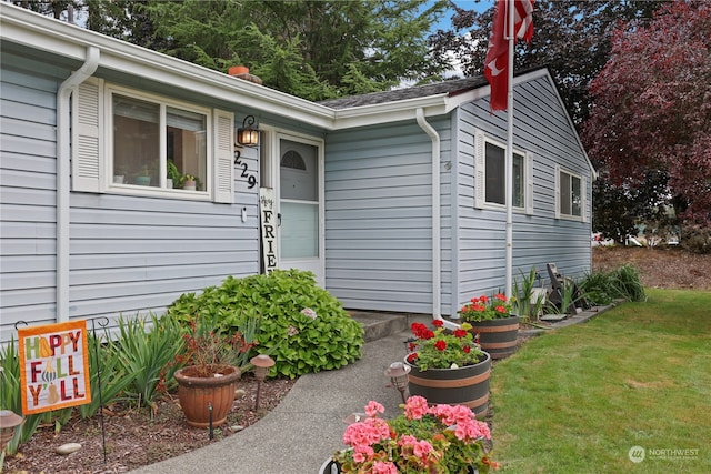 exterior space featuring a lawn