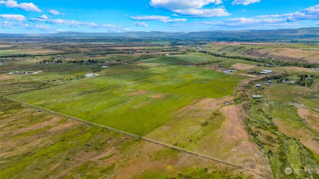 aerial view featuring a rural view and a mountain view