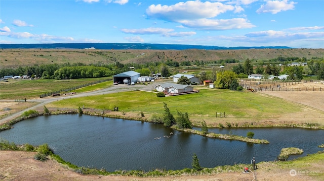 aerial view featuring a water view and a rural view