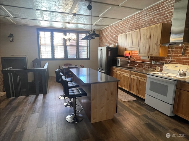 kitchen with stainless steel refrigerator, white electric range, wall chimney range hood, dark hardwood / wood-style floors, and a kitchen island